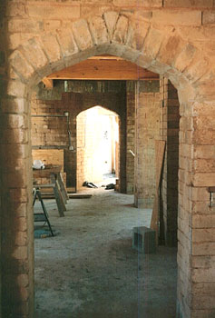 exposed adobe arch