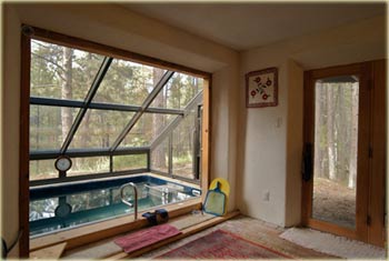 pumice-crete interior with angled windows